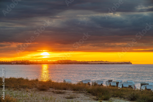Fototapeta Naklejka Na Ścianę i Meble -  Fantastically beautiful sunset over the Baltic Sea at Boltgenhagen beach