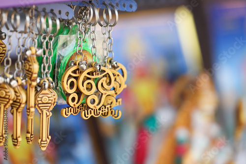 Indian traditional tamil om symbol keychains for sales in market shop