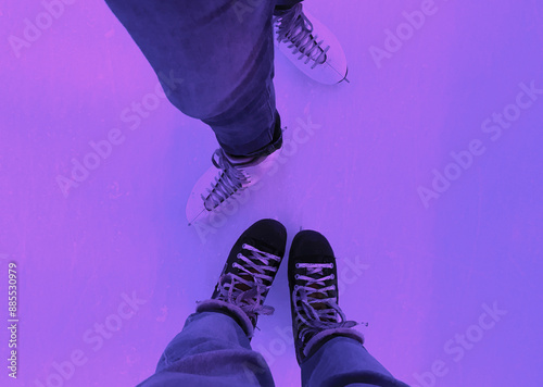 a couple in love is skating on ice photo