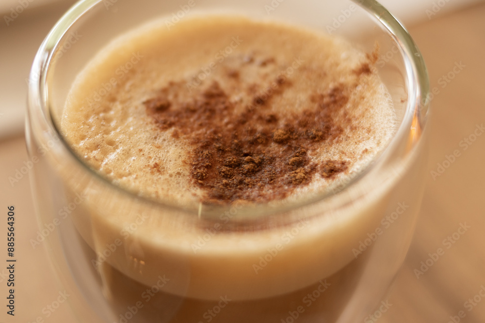 Transparent double-glass cup of coffee cappuccino Transparent double-glass cup of coffee cappuccino