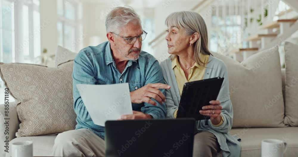 Senior couple, documents and sofa with tablet for financial discussion, expenses or bills at home. Elderly man and woman discussing paperwork with laptop for finance, retirement or pension fund Senior couple, documents and sofa with tablet for financial discussion, expenses or bills at home. Elderly man and woman discussing paperwork with laptop for finance, retirement or pension fund