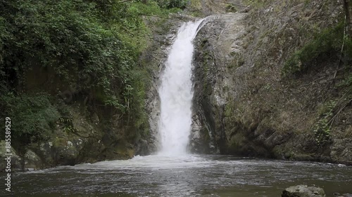 Beautiful waterfall in tropical forest in Chae Son National Park, Lampang, Thailand - Slow Motion