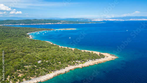Wallpaper Mural An aerial view of the Blue Lagoon at Plaža Krušćica and Tarej Beach on the island of Cres, showcasing their fantastic turquoise waters and surrounding islands. Boats dot the serene lagoon Torontodigital.ca