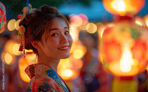 Joyous woman in a traditional yukata celebrates the obon festival, surrounded by warm glow of lanterns during a japanese summer evening photo