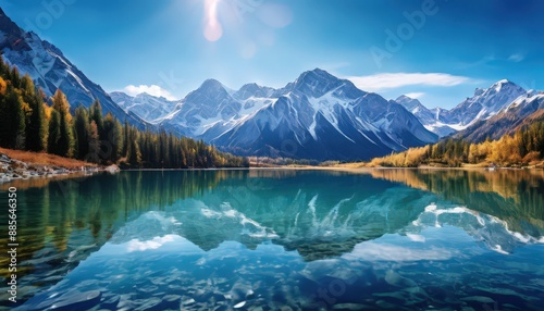 Serene Sunrise Lake and Snow-Capped Mountains