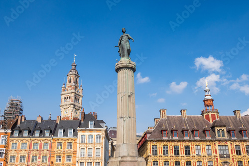 Grand Place in the city of Lille and its belfry over blue sky