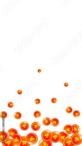 Vitamin A round capsules scattered randomly.