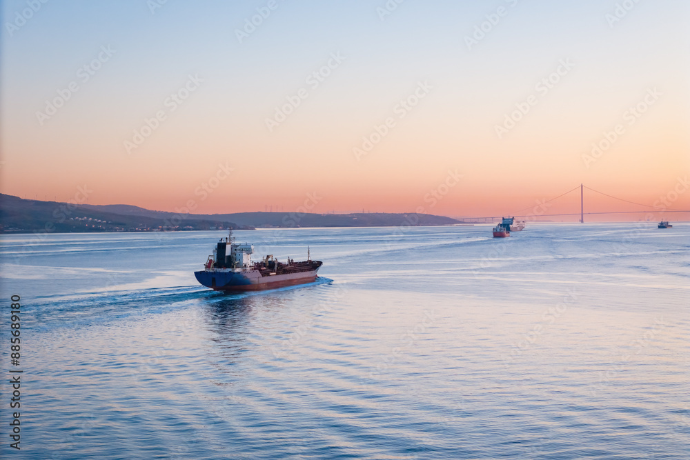 Petrochemical oil product cargo ship carrier underway in calm sea. Aerial view Petrochemical oil product cargo ship carrier underway in calm sea. Aerial view