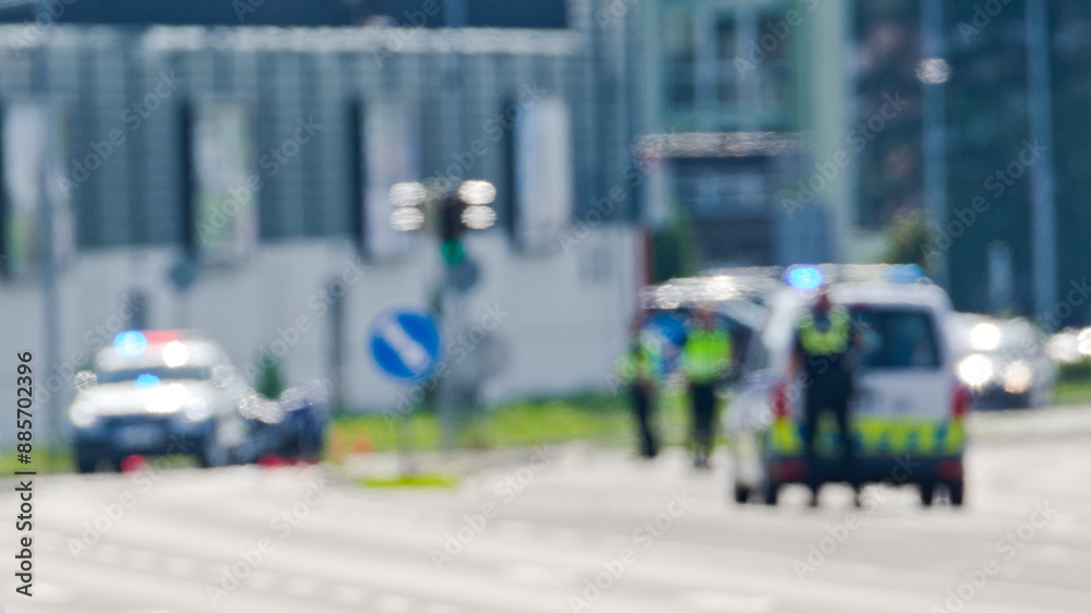 Two police cars and police officers in action. Blurred police scene. Czech police stock photo. Two police cars and police officers in action. Blurred police scene. Czech police stock photo.