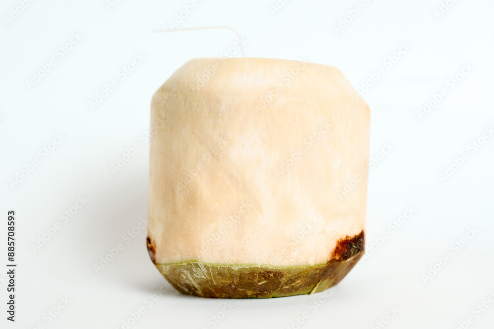 Fotografie Freshly Cut Cube-Shaped Coconut on a Clean White Background