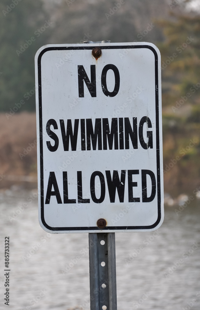 No swimming allowed signpost No swimming allowed signpost