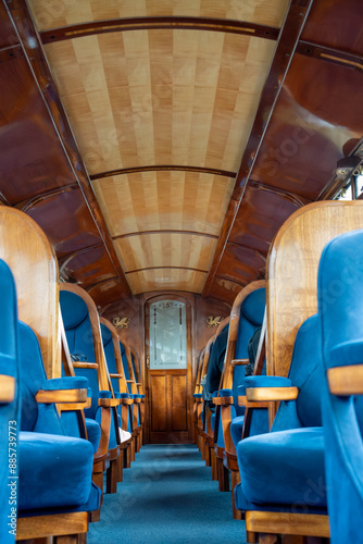 beautiful interior of a steam train passenger carriage, a vintage working steam locomotive train of the Ffestiniog Railway, Porthmadog, Wales photo