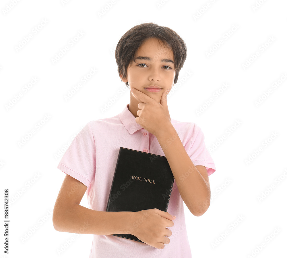 Thoughtful little boy with Bible isolated on white background Thoughtful little boy with Bible isolated on white background