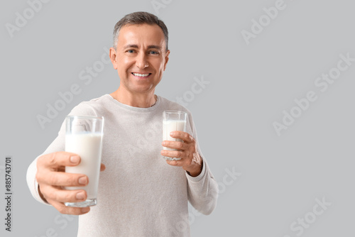 Mature man with glasses of ...