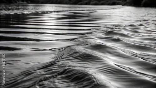 An inspiring black and white stream with waves rapidly receding into the distance, immerses you in a world of reflection and silence. 