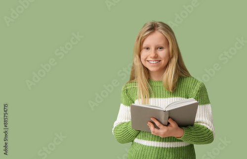 Cute little girl with book ...