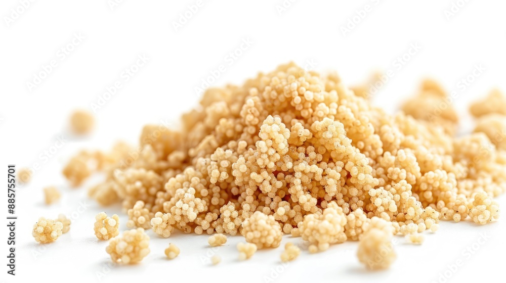 A stack of unprocessed millet grains on a clean, white background A stack of unprocessed millet grains on a clean, white background
