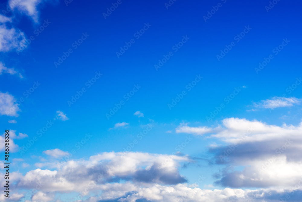 low clouds on the blue sky. good weather forecast. sunny afternoon in winter