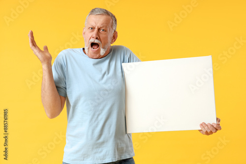 Shocked senior man with bla...