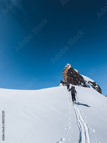 back country skiers on their way to the summit