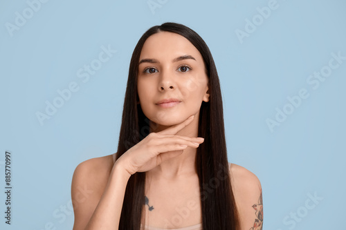 Beautiful young woman with ...