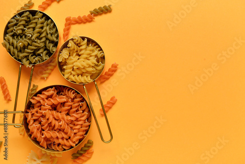 Colorful fusilli pasta in m...