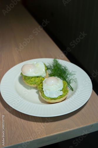Eggs Benedict and poached eggs on avocado toast. Great for brunch fans and food lovers who want tasty and pretty dishes