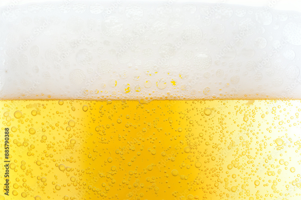 Beer background with frothy foam and bubbles. Beer refreshing texture with sparkling yellow amber beer Beer background with frothy foam and bubbles. Beer refreshing texture with sparkling yellow amber beer