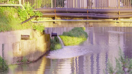 Draining sewage from pipe into river Concept of pollution rivers and ecology Water pollution sewer drain pipe dirt sewage water drain Bad waste water from city wastewater management