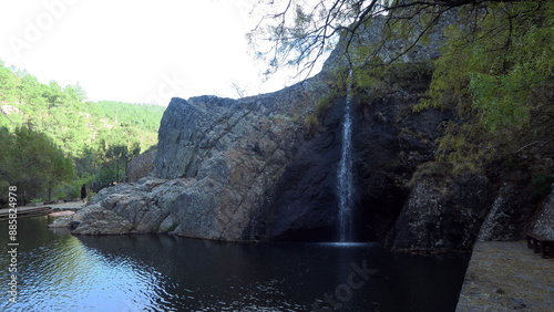 Penha Garcia, Portugal. Pego waterfall and river beach, a deep valley marked by huge cliffs that hold trace fossils and transform the pool into a natural amphitheater.