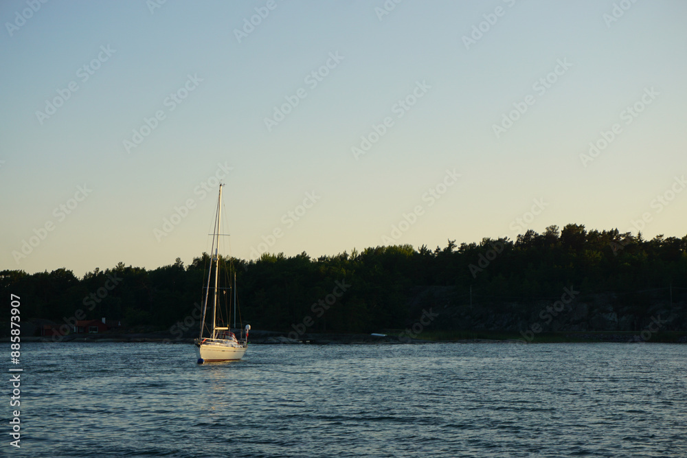 a small boat sailing the sea a small boat sailing the sea