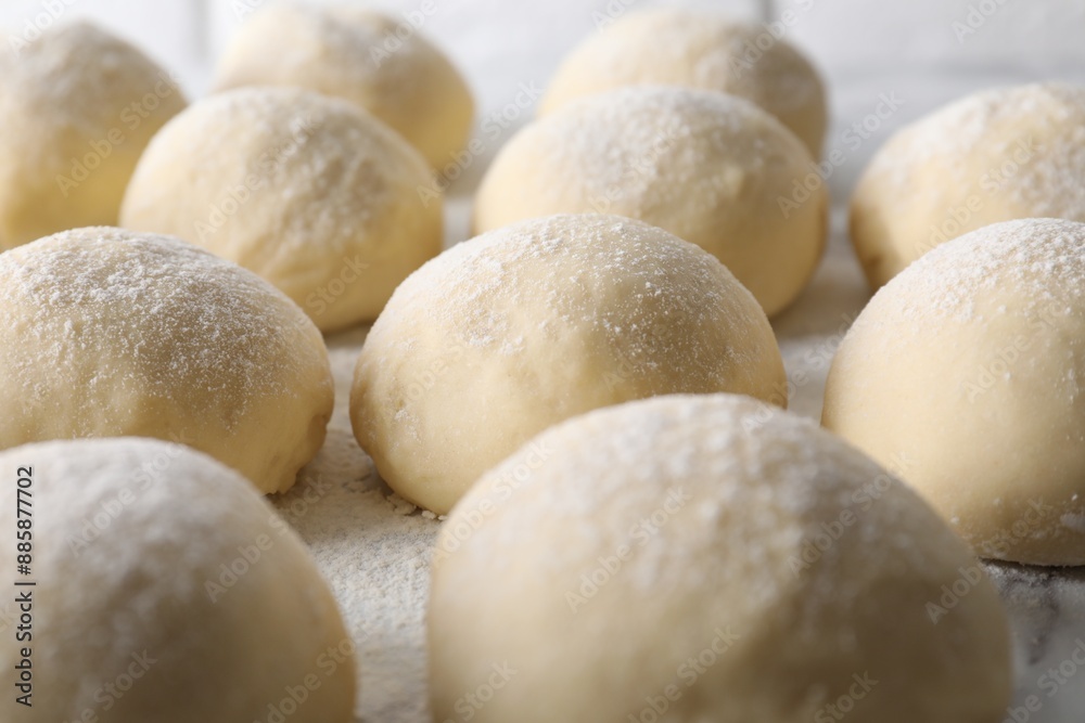 Fototapeta premium Many raw dough balls on board, closeup