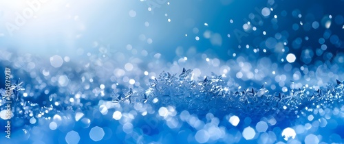 Abstract Blue Snowflakes Background with Bokeh