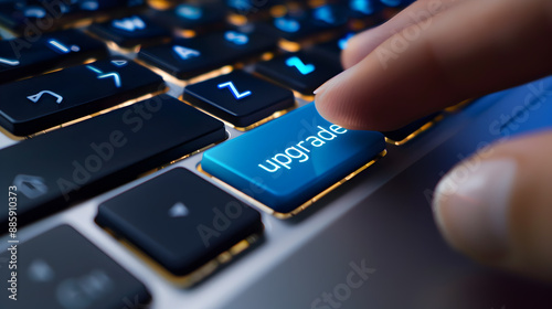 
Finger Pressing an Upgrade Key on a Keyboard Representing Advancements in Technology and Software Improvements for Enhanced User Experience