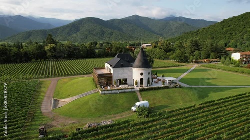 Top view of Chateau Buera Winery and Vineyards, nestled in the lush green mountains near Lopota Lake in Georgia's Kakheti region. photo