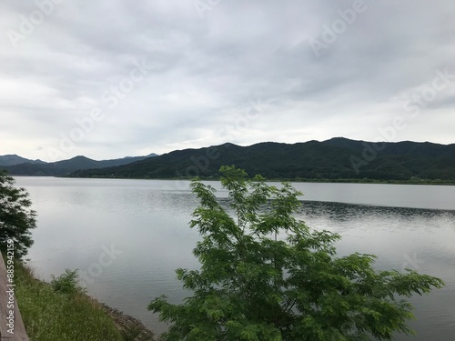 a landscape reflected by the river