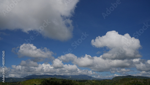 beautiful landscapes bue sky with white cloud, with hills, mountain and forest. at Talang Barisan village, Muara Enim, South Sumatera, Indonesia photo