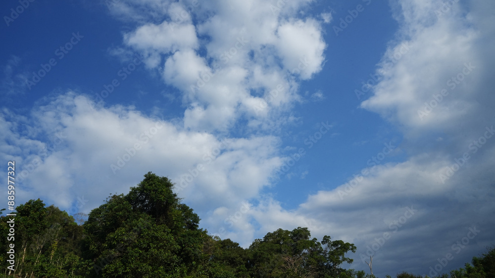 beautiful landscapes bue sky with white cloud, with hills, mountain and forest. at Talang Barisan village, Muara Enim, South Sumatera, Indonesia beautiful landscapes bue sky with white cloud, with hills, mountain and forest. at Talang Barisan village, Muara Enim, South Sumatera, Indonesia