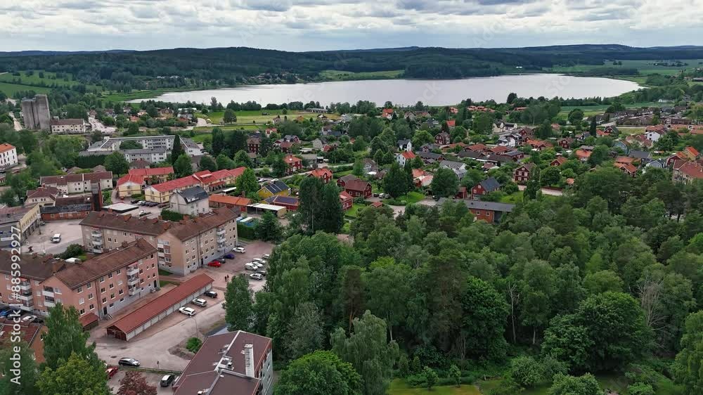 Hedemora city in sweden with lush greenery and houses in a serene neighborhood, aerial view, hyperlapse Hedemora city in sweden with lush greenery and houses in a serene neighborhood, aerial view, hyperlapse