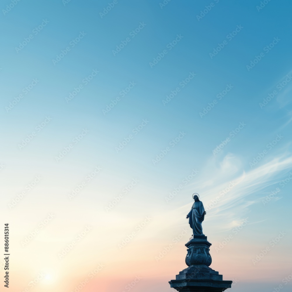 Statue against a serene, colorful sunset sky, capturing tranquility and artistic beauty in a stunning landscape. Statue against a serene, colorful sunset sky, capturing tranquility and artistic beauty in a stunning landscape.