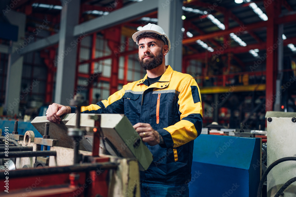 Industrial man engineer wear uniform working and checking system machine at factory. Workers industrial factory. Machine maintenance technician operation concept. Industrial man engineer wear uniform working and checking system machine at factory. Workers industrial factory. Machine maintenance technician operation concept.
