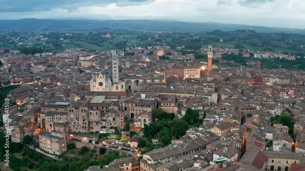 Bird's-eye aerial view over medieval UNESCO city of Siena in Tuscany Italy Bird's-eye aerial view over medieval UNESCO city of Siena in Tuscany Italy