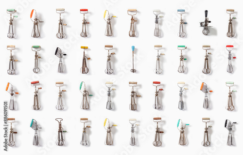 Flatlay collection of vintage handheld beaters  photo