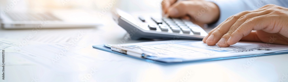 Detailed image of a tax consultation session, focusing on hands, documents, and calculator, with room for copy space. Detailed image of a tax consultation session, focusing on hands, documents, and calculator, with room for copy space.
