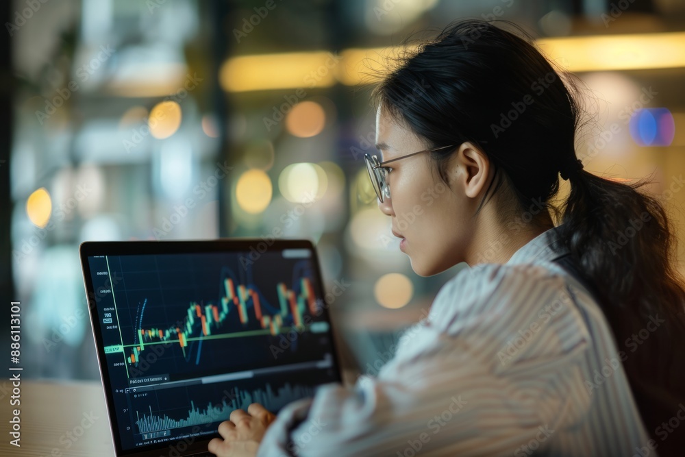 Fototapeta premium Professional Photography of young Asian investor analyzing cryptocurrency market trends, Generative AI