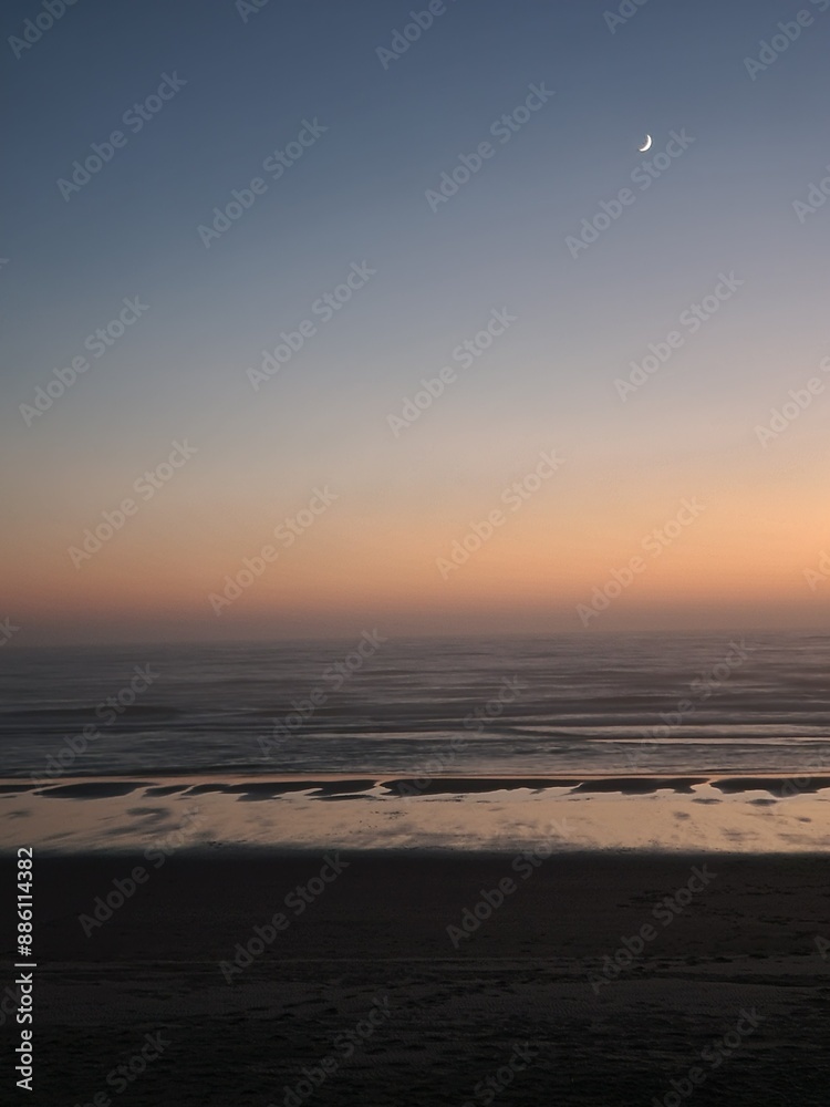 sunset on the beach with moon sunset on the beach with moon