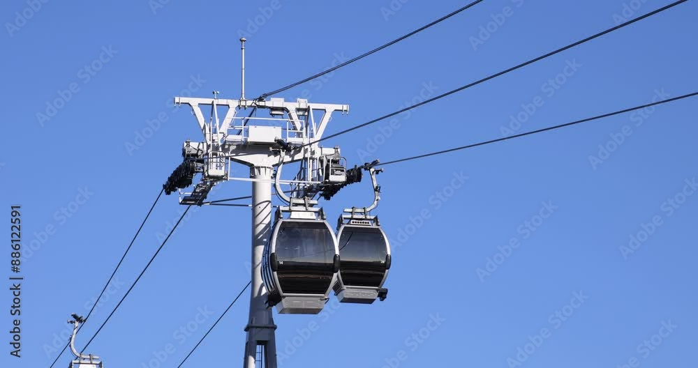 A moving ropeway at the business town in Yokohama telephoto shot A moving ropeway at the business town in Yokohama telephoto shot