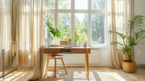 Clean and airy home office space with a minimalist desk and natural light flooding