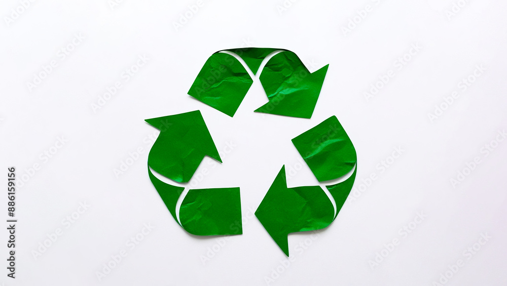 Recycling symbol made of green paper, Green paper cutout of a recycling symbol, Recycling icon isolated in a white background Recycling symbol made of green paper, Green paper cutout of a recycling symbol, Recycling icon isolated in a white background