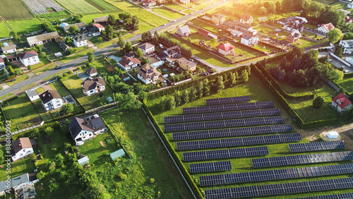 Green Neighborhood with Solar-Powered Homes Aerial View photo